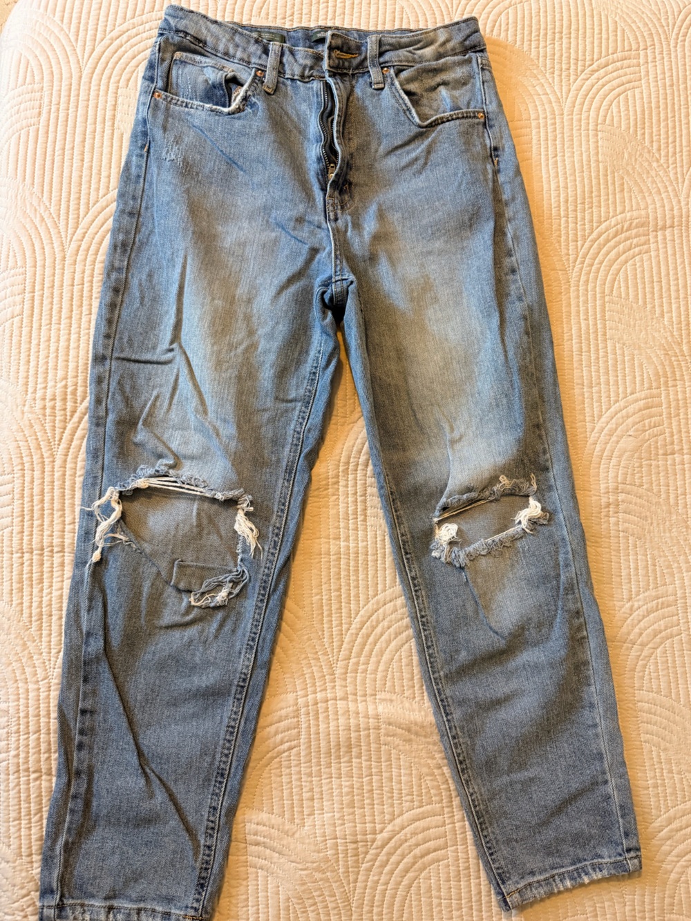 Distressed Blue Jeans